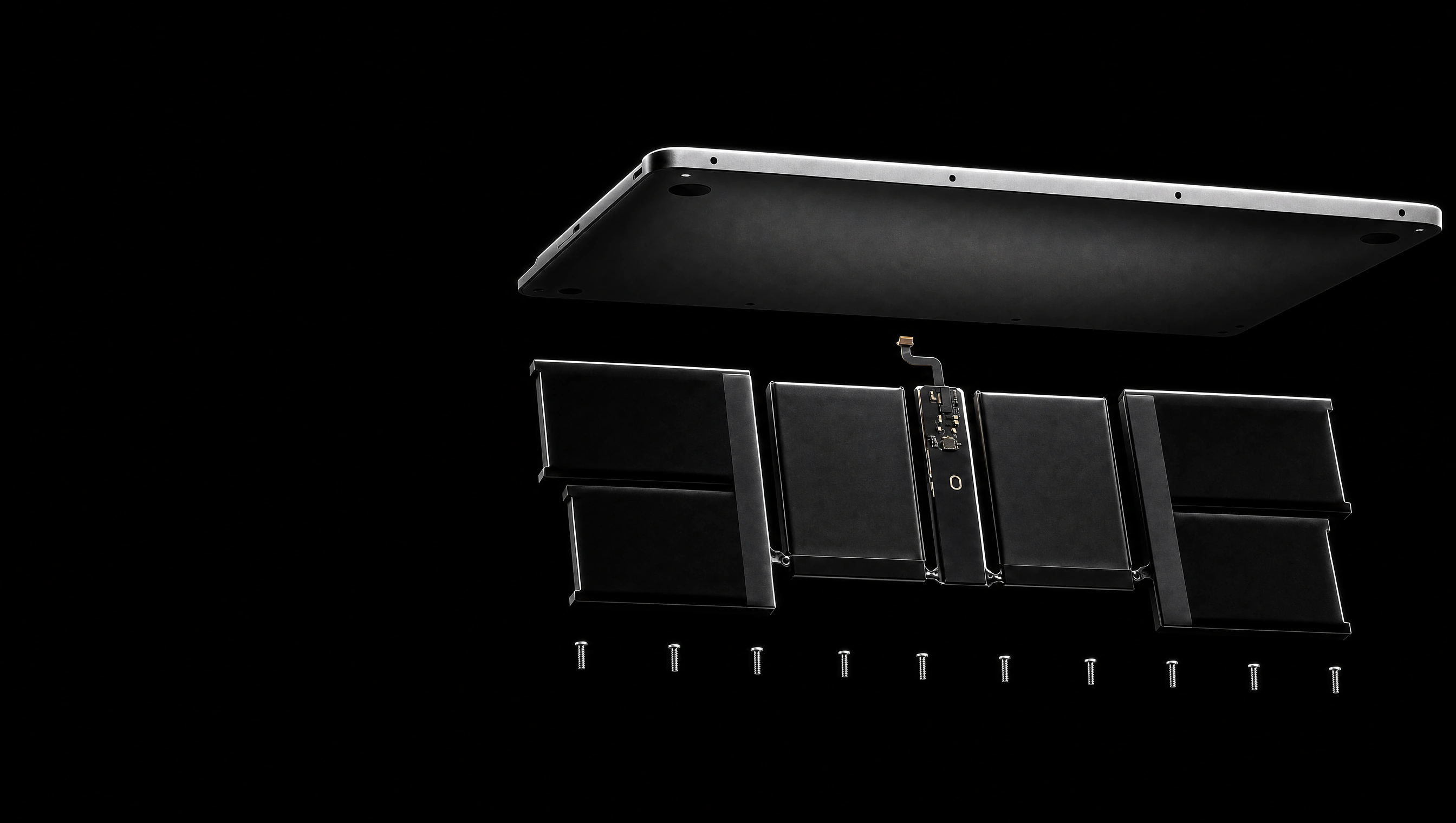 An edge-lit MacBook bottom case floating above its black battery pack and a row of screws in exploded registration on a black studio void